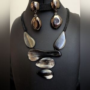 #10. MCM Modernist Bulls Horn Necklace With Chico's Hermatite Earrings